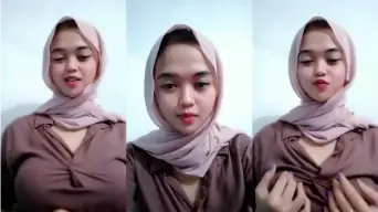 Gadis Berjilbab Meremas Payudara Menggoda Pria